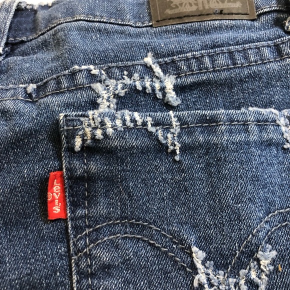 Levi's Size 14 Distressed Star accent
Girl's Step Up Denim Shorts - Picture 4 of 10